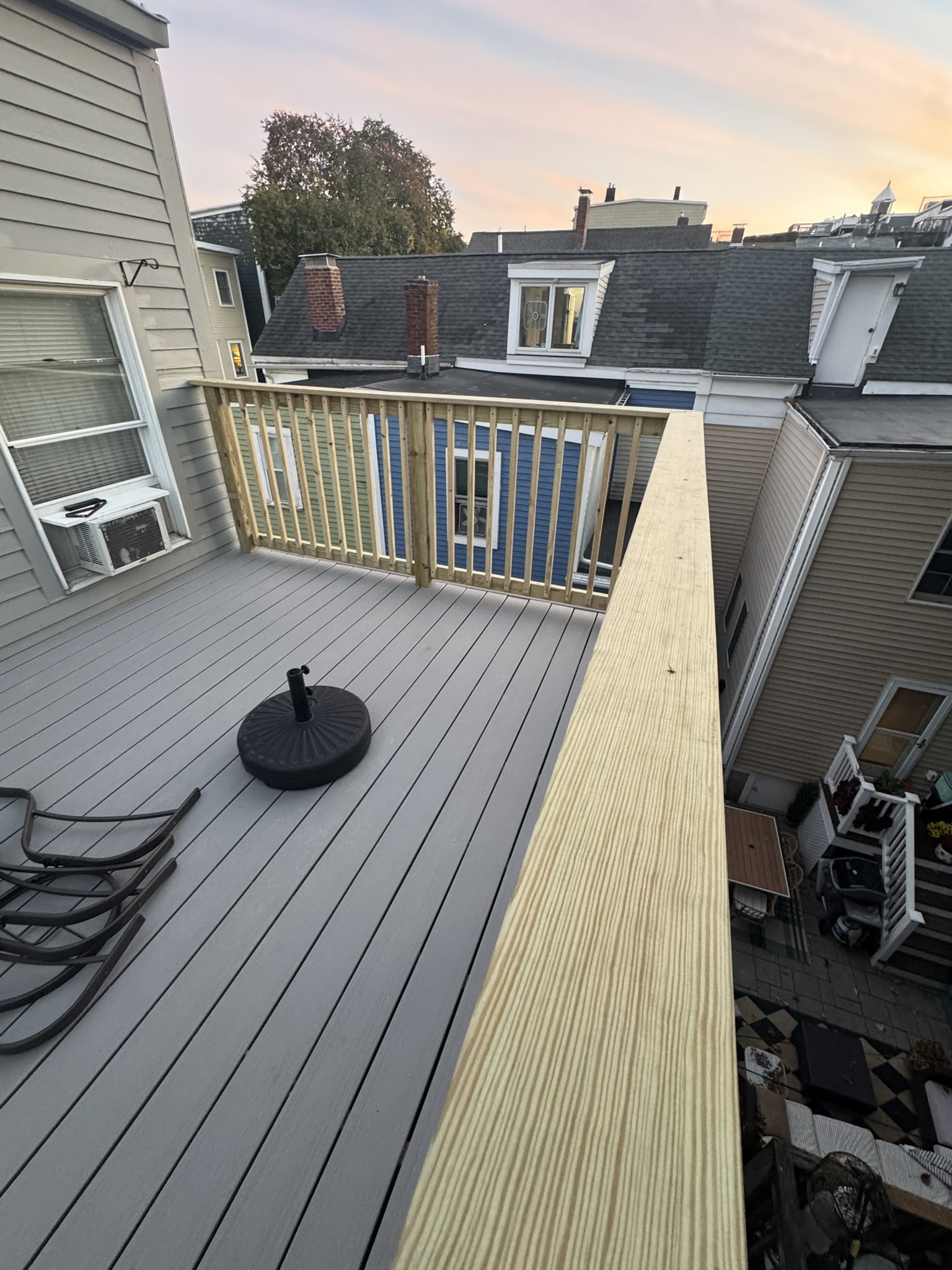 Completed deck renovation with new composite decking and railing system